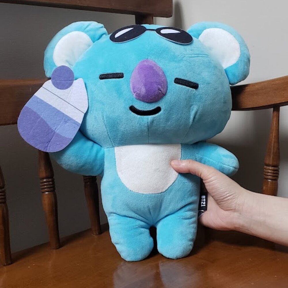 BT21 Blue Koala Wearing Sunglasses With A Drink